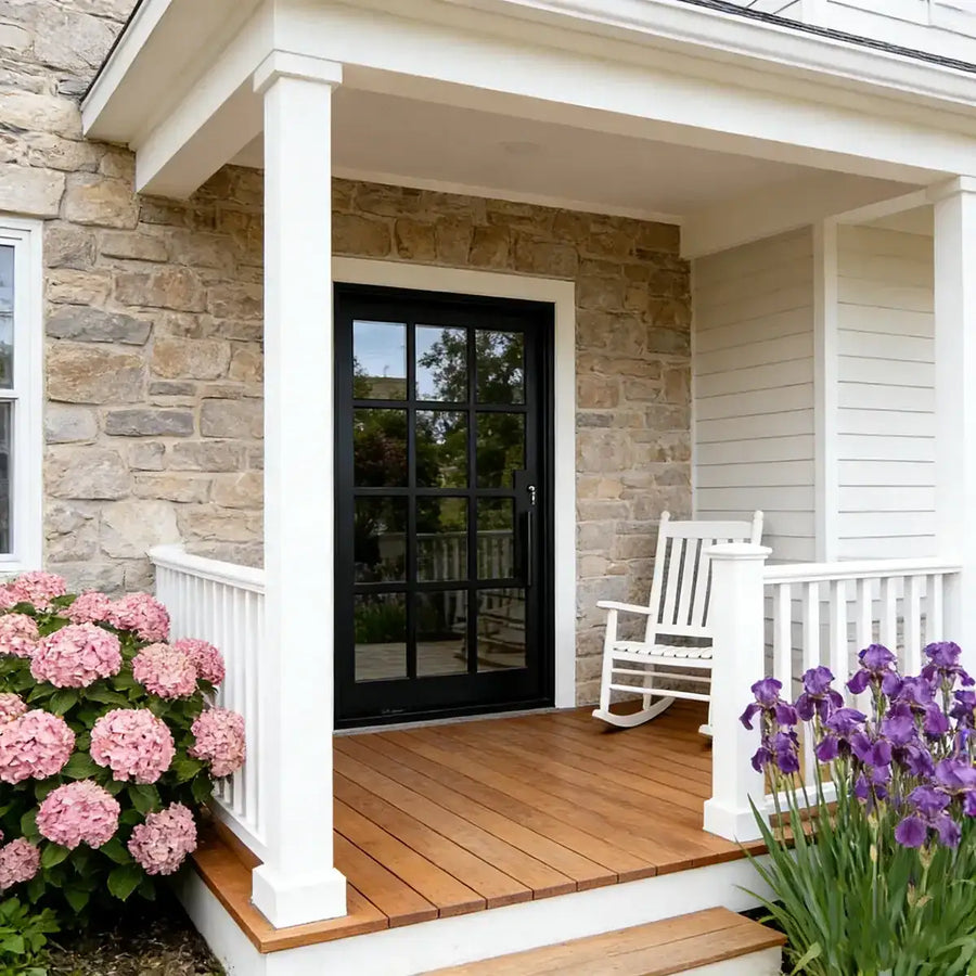artisan-iron-pivot-entry-door-with-clear-glass-grid-porch-entrance-aed-artisanentrydoors