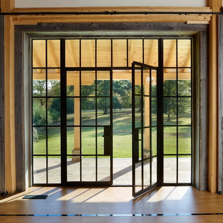 artisan-grand-iron-entrance-double-doors-transom-and-sidelights-black-frame-stately-design-french-style-aed-artisanentrydoors