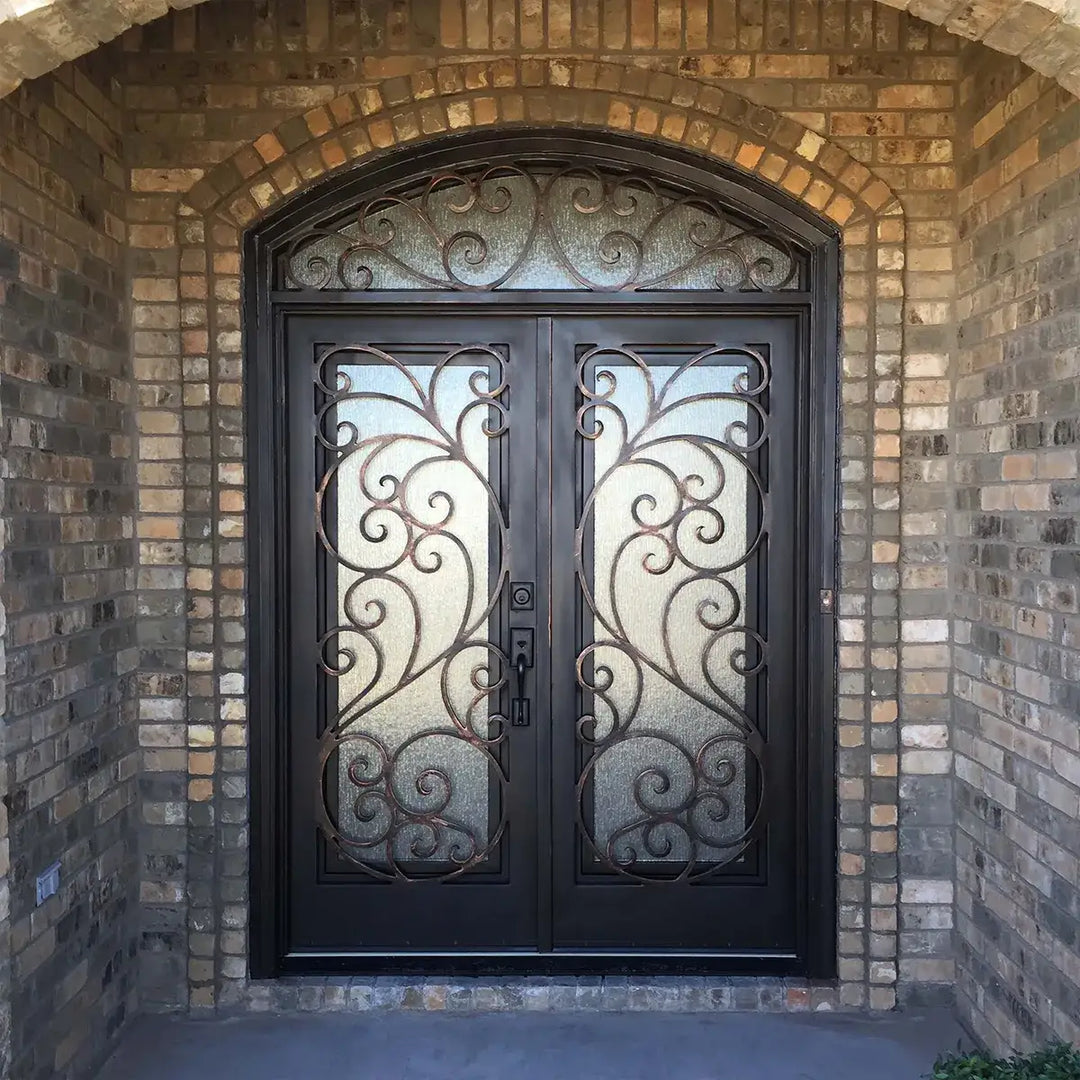 artisan-metal-front-entry-double-doors-intricate-scrollwork-arched-transom-artisanentrydoors